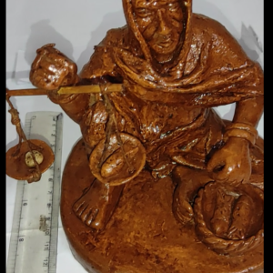 Free Hand Statue Sitting Woman Seller